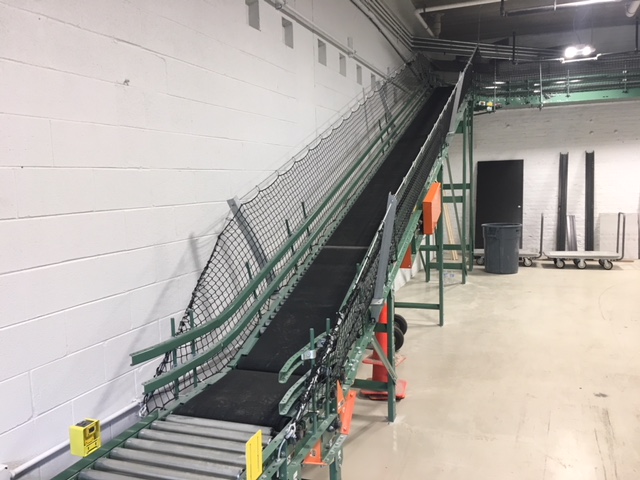 Custom incline belt conveyor to storage area