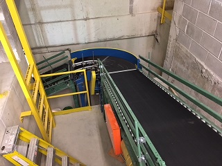 Custom incline conveyor for retailer