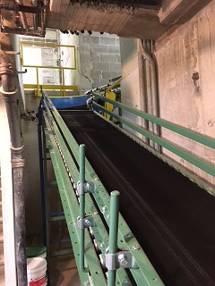 Spiral curve conveyor navigates tight area