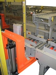 Case Lift and Rotates product for discharge on Motor Driven Roller conveyor