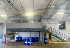 Mezzanine supporting modular office space